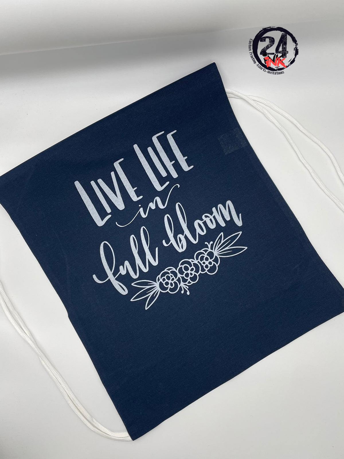 Live life in full bloom drawstring bag